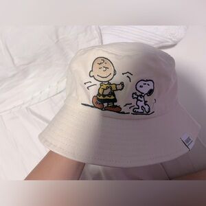 peanuts snoopy and charlie brown dancing bucket hat cream color